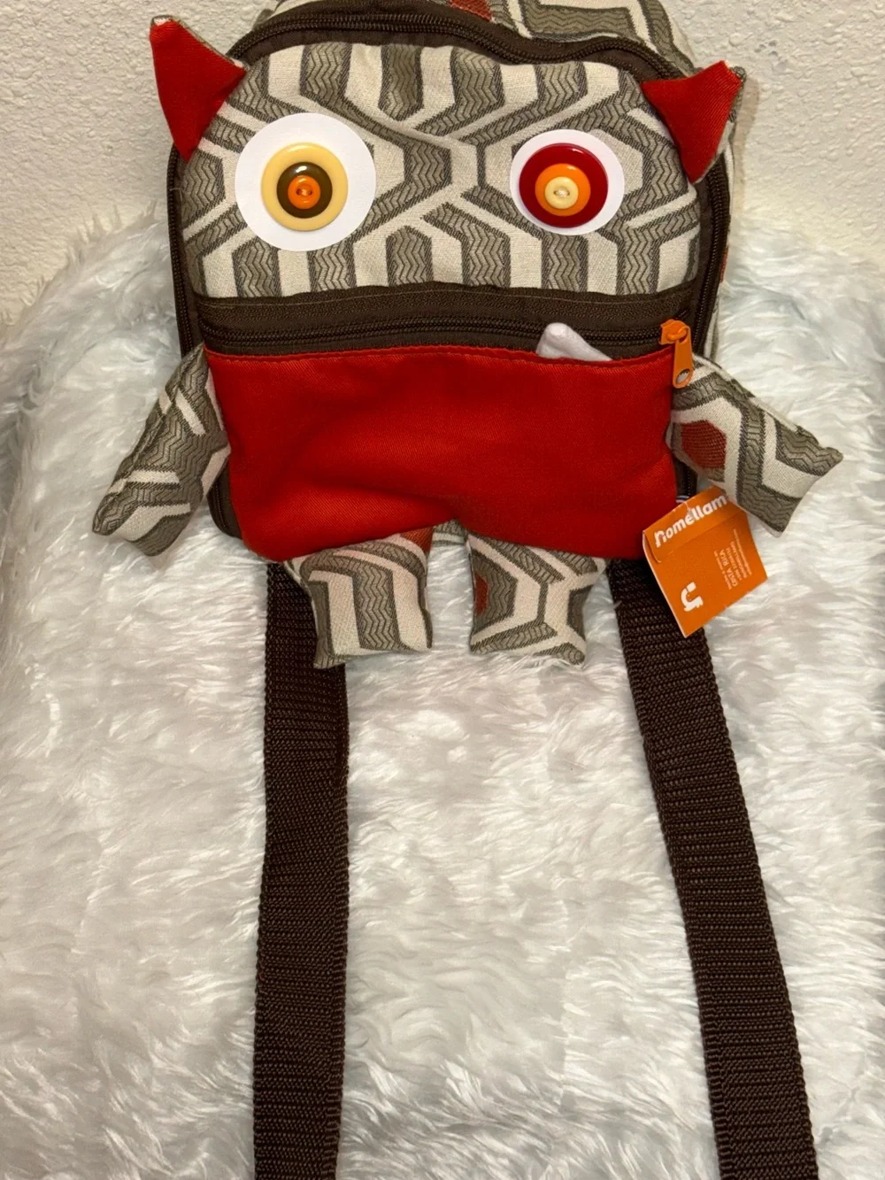 Playful Red Monster Kids Backpack with Geometric Pattern